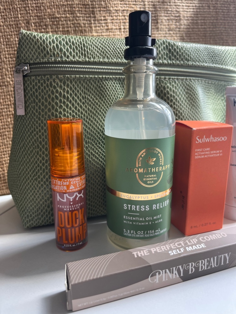 Clinique Cosmetic Bag with Travel Skincare & Makeup Set - Picture 2 of 5